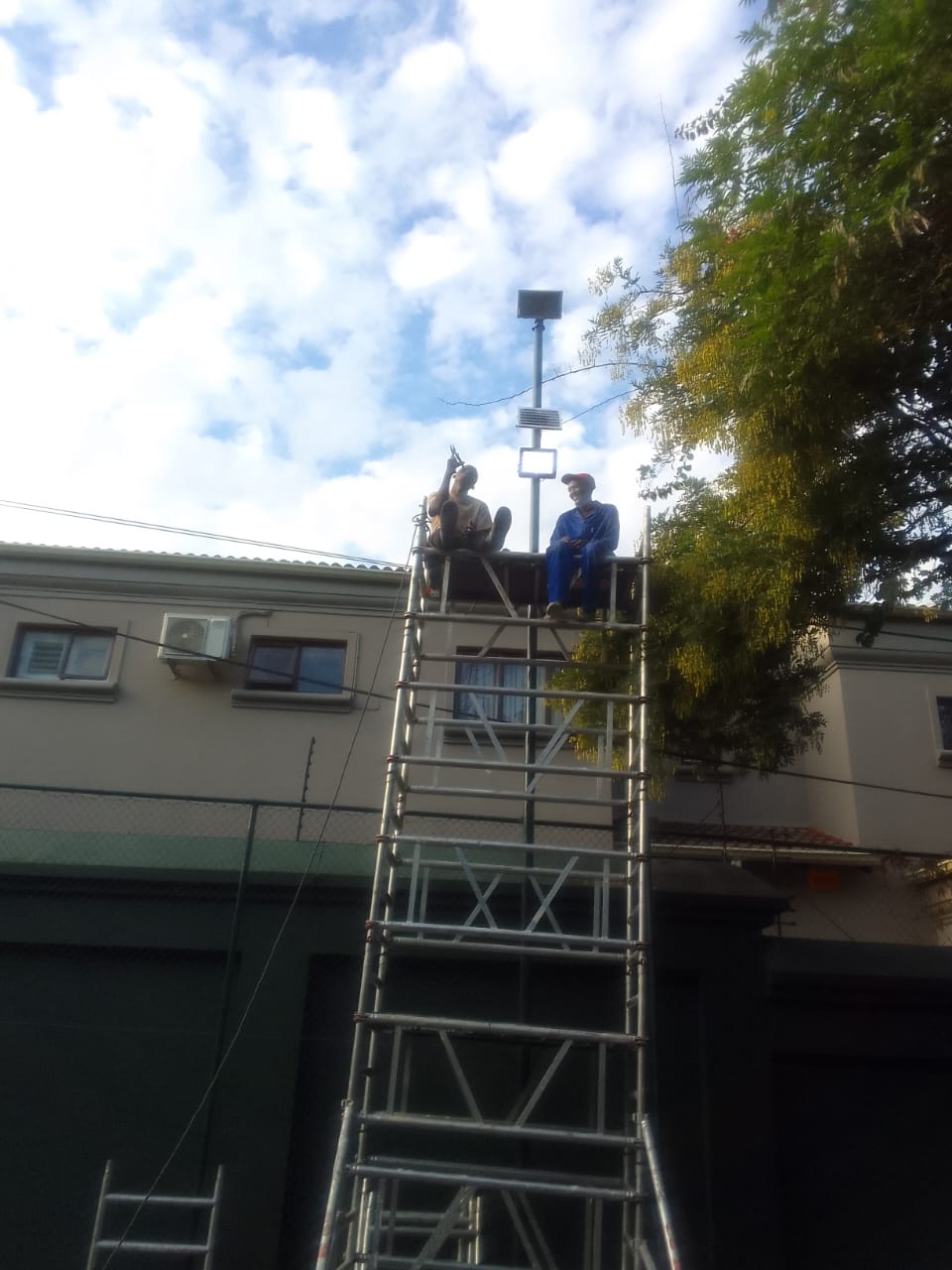 Professional tiler aligning ceramic tiles for seemless pattern