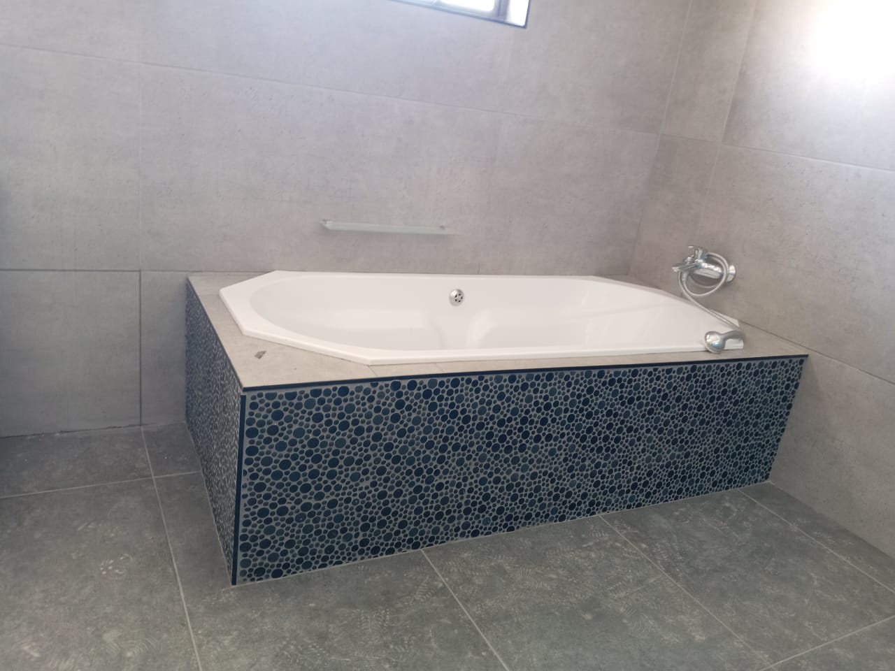 Durable outdoor paving tiles installed for a weather-resistant surface